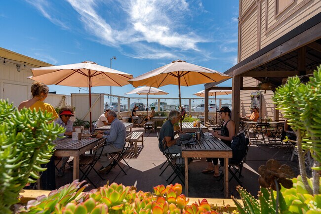 The patio at The Hidden Kitchen offers excellent ocean views while you dine.