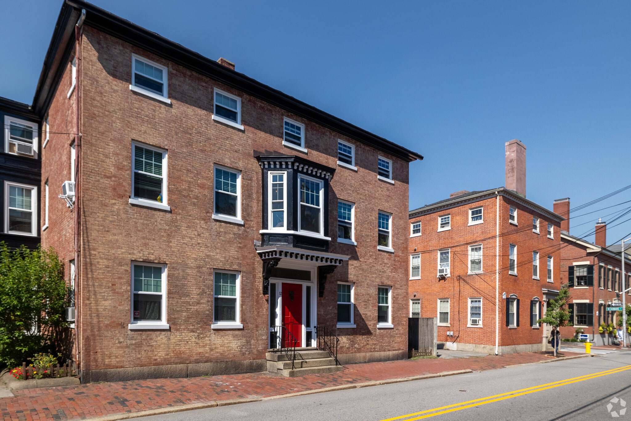 A number of classic Federal Style homes line the sun soaked streets of Salem.