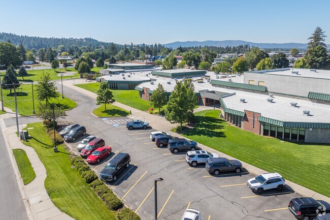 Greenacres Middle School is located next to a main arterial road.