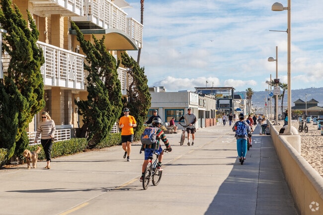 Take a bike ride down the strand from Hermosa Beach, CA to either Redondo or Manhattan Beach.
