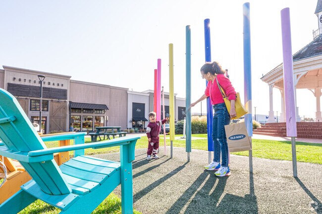 Families come an afternoon out and about at the Garden City shopping center in Warwick.