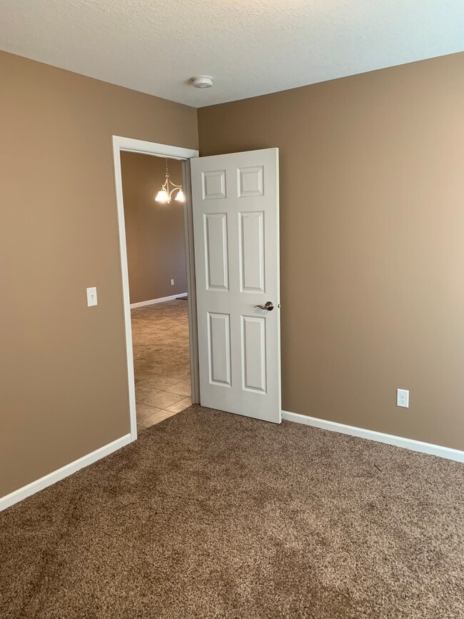 One of the large bedrooms opens into the living space