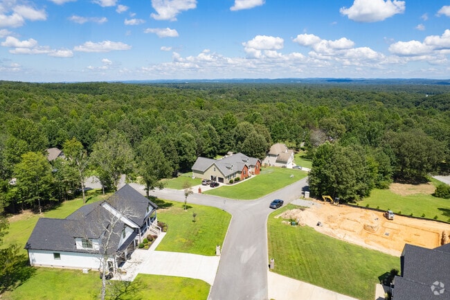 Chickamauga homes have a natural landscape with an abundance of mature trees.