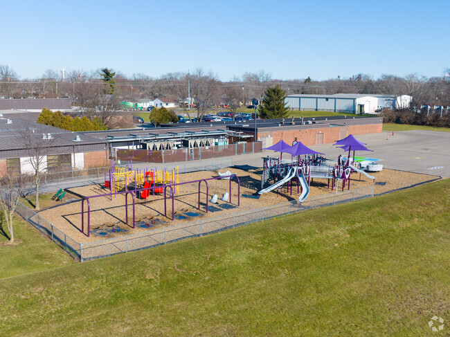 Many kids enjoy recess on the playground.
