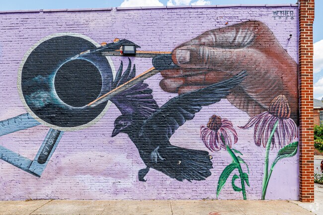 Baltimore is known for large artistic murals, including in Poppleton.