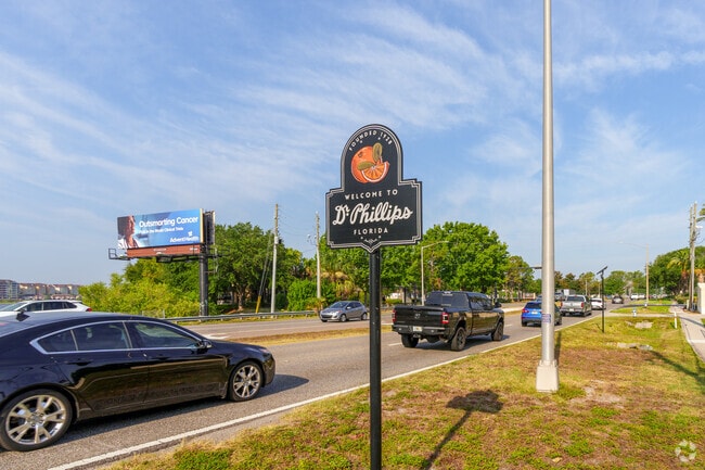 A sign welcomes you to Dr. Phillips, founded in 1928.