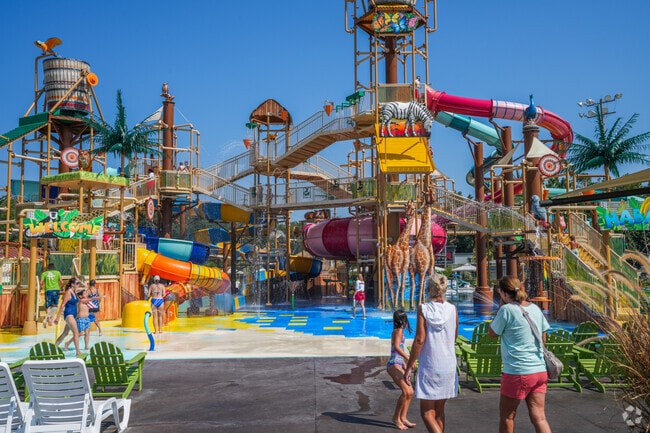 Visitors flock to Serengeti Springs Waterpark for its exciting slides and expansive wave pools.