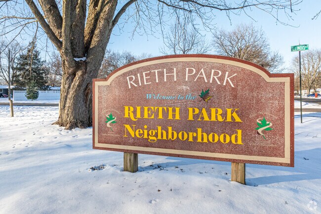 A sign in the neighborhood's namesake park welcomes visitors and residents to Rieth Park.