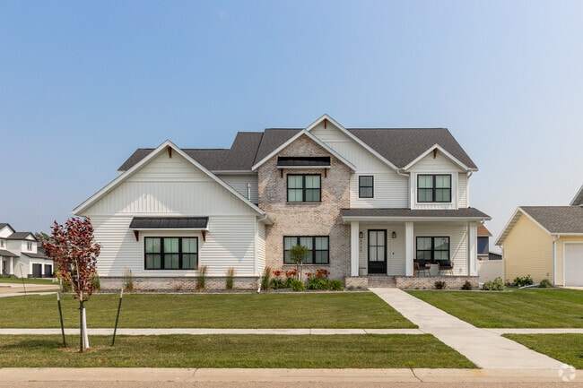 Common design features include large windows for natural light, for these Fargo-based homes.