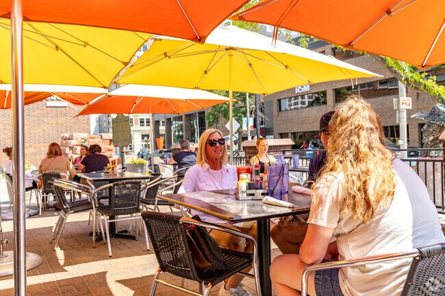McKennan Park residents enjoy fresh air and delicious food on Phillips Ave.