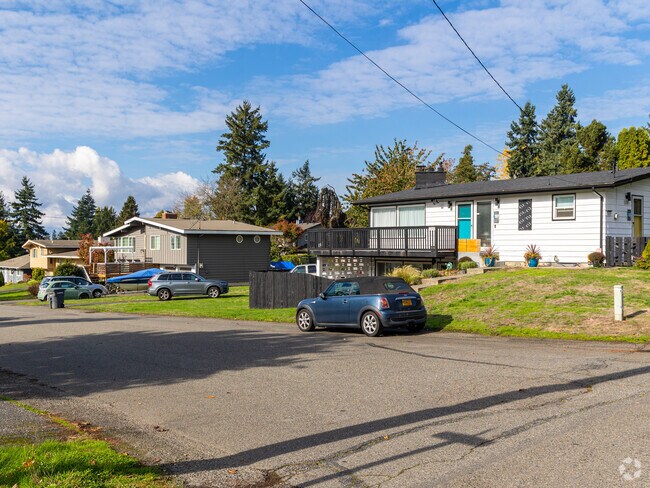 A row of wood-sided rancher homes in Pacific Ridge, Des Moines.