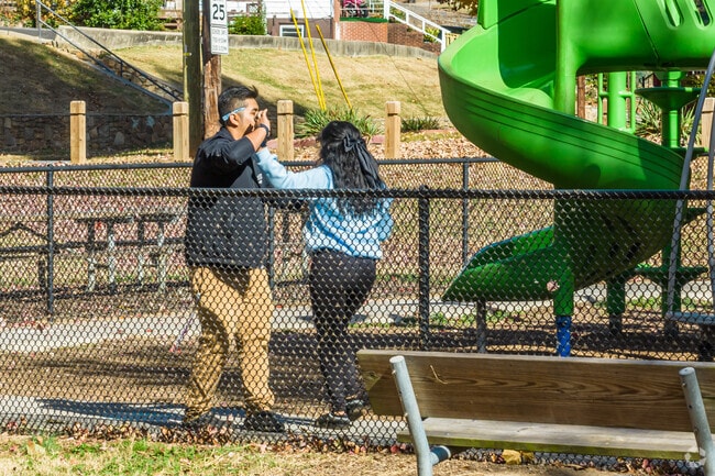 In North East Winston, teenagers refine their dance moves through practice.