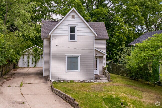 This older farmhouse is an earlier style of home in the neighborhood of West Douglas.