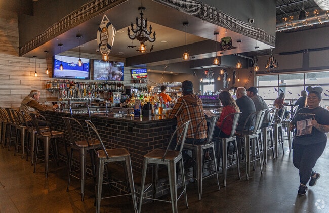 If those lake winds roll in, come inside to the cozy bar at JP's Waterfront in Gibraltar.