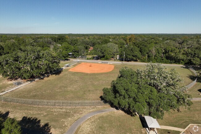 A playground, a baseball diamond and basketball courts surround the Bagdad Community Center.