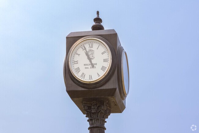 A vintage clock marks the Malverne LIRR station in the heart of downtown.