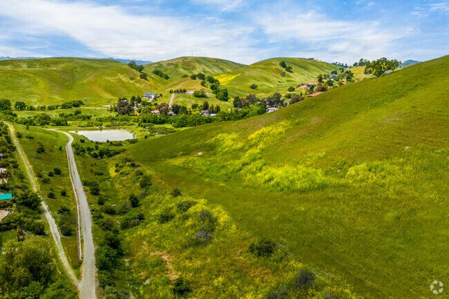 The Tassajara Ridge Trails Wind Through a Scenic Landscape of Rolling Hills, Offering Stunning Views of the Surrounding Hills and Valleys.