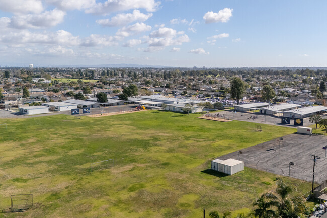 The locals love the large grassy field in the summer at Village View Elementary School.