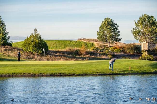Play a round of golf at The Home Course in DuPont and enjoy the surrounding landscape.