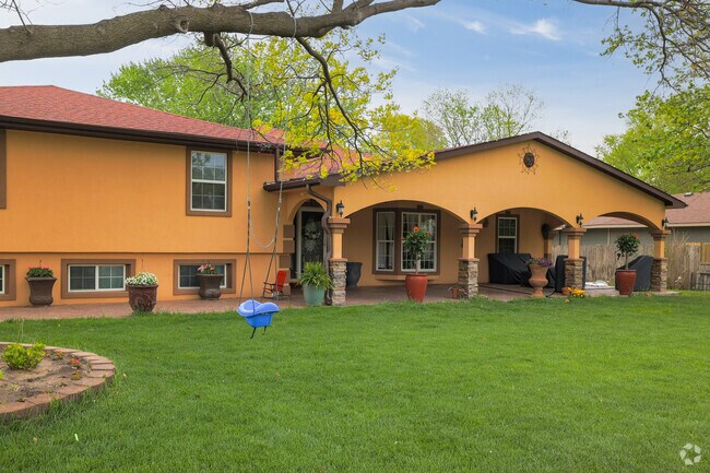 Southern inspired home with red clay shingles in Benjamin Hills-Pleasant Valley.