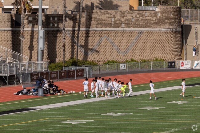 The kids at Westview High School warming up before a soccer game in Torrey Highlands.