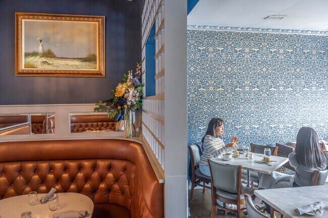 Find savory New American cuisine at the eclectic Gatsby's Landing overlooking Roslyn Pond.