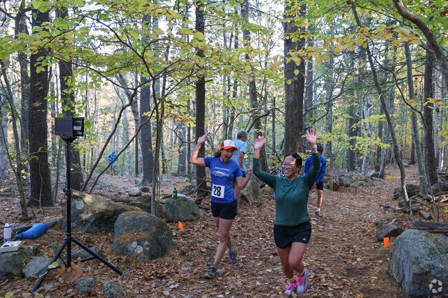 Friends cheer on as you cross the line at the Ravenswood Run.