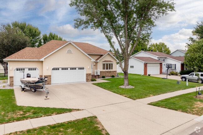 Many homes in Trollwood offer ample garage space with plenty of room for a boat and snowmobiles.