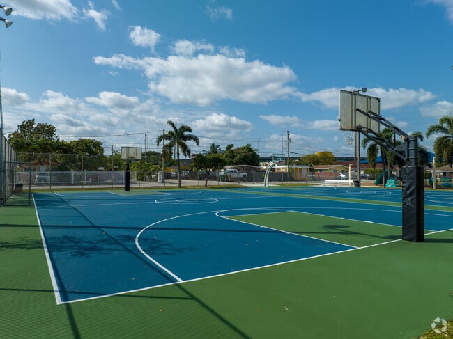 Basketball courts fill Coston Park in Seminola City, Hialeah.