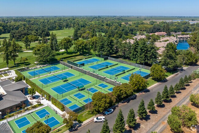 Play a game of tennis at the Del Rio Country Club in the Del Rio neighborhood.
