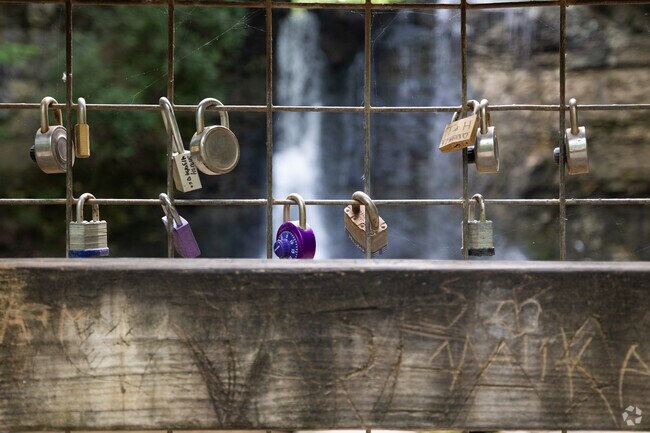 Hayden Falls Park features locks for love next to the stunning waterfall.