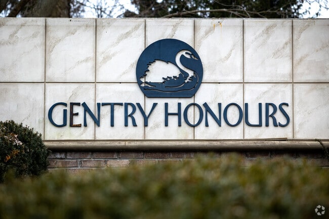 There are several neighborhood signs at the entry points of Gentry Estates.