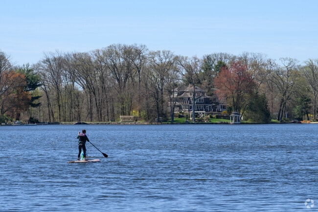 When it's too cold for a swim, you can still enjoy the water on a paddleboard in Mountain Lakes.