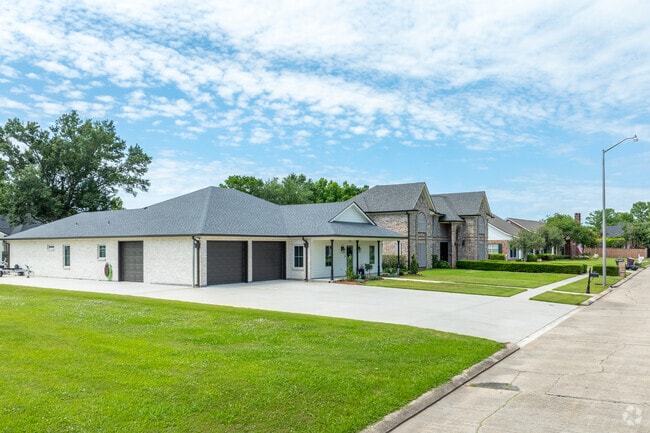 Rows of homes in Sugar Mill feature well-manicured lawns along quiet streets.