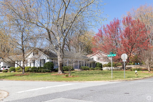 Spring's arrival paints a lush Hamilton Forest backdrop for these homes.