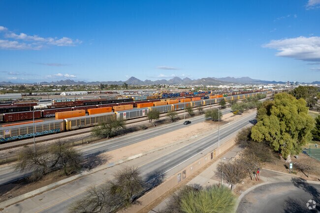 Union Pacific Trains run alongside Aviation Parkway, a local bypass in Barrio Centro.