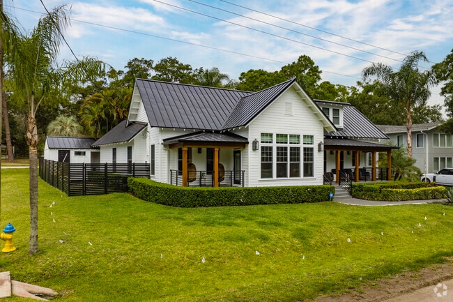 A beautiful Farmhouse style home in Riverbend adds to the character of the neighborhood.