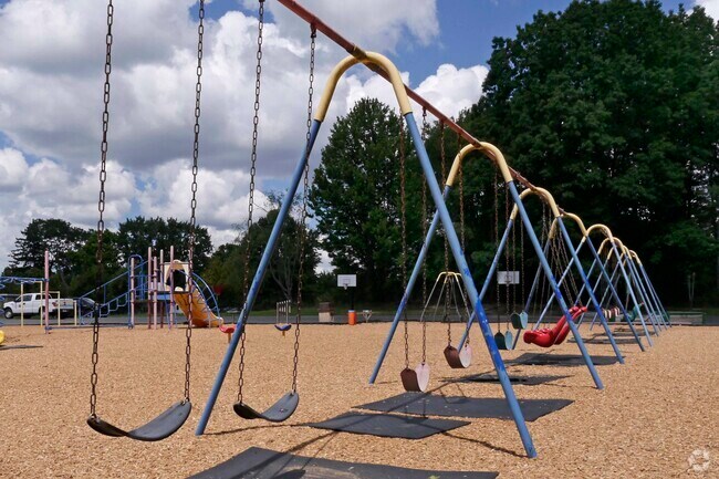 A row of swings on the playground at Echo Hills Elementary School
