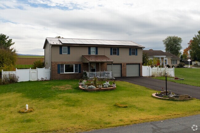 Home in Greene overlooks surrounding farmland and open fields.