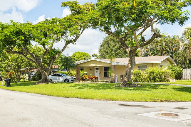 Live in a tranquil ranch-style home in Dania Beach and enjoy a peaceful life.