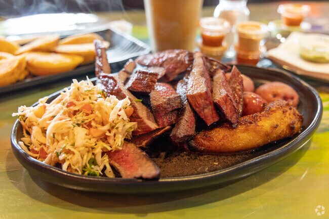 International Gardens specializes in meats and Colombian cuisine.