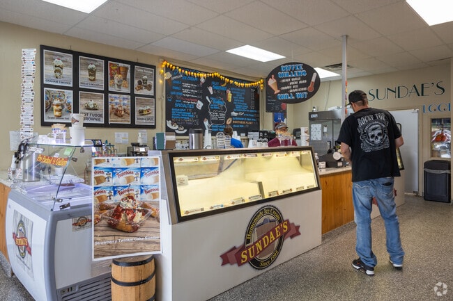 Locals enjoy the colorful interior of the popular Sundae's on 79th Street in Geist.