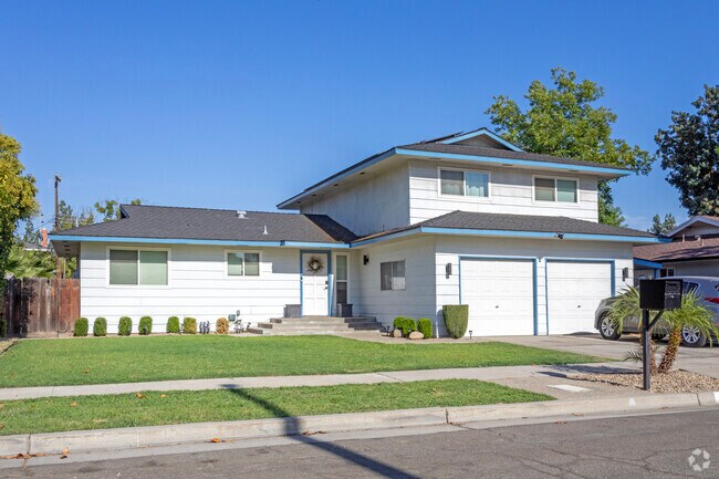 Grassy front yards are a typical feature of homes in the Hoover neighborhood.