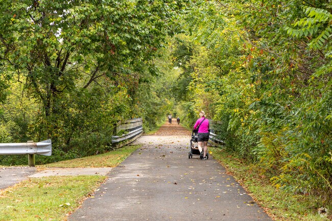 The B&O Trail runs behind Lexington’s downtown, shaded by trees and lined with benches.