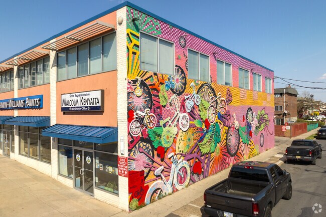 Brightening Broad Street at Sullivan Progress Plaza, the Indego Mural graces Yorktown.