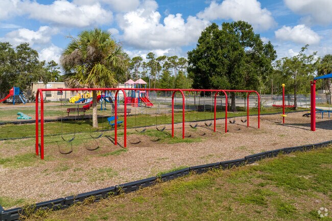 Three Oaks Elementary School in Estero has a large playground with swings for students.