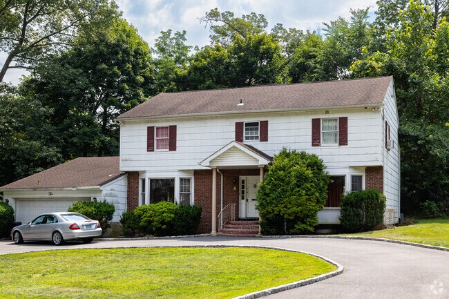 Colonial Revival homes add timeless elegance to Pelham Manor’s streets.