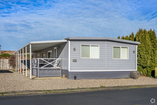 This double-wide manufactured home is an affordable way to live in Southeast Mill Creek.