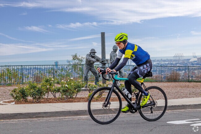 Reaching the crest of the hill by bicycle is an achievement.