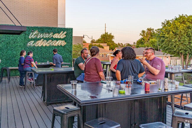 Enjoy a drink on the second floor patio at Up Down in the Plaza District near Classen Ten Penn.